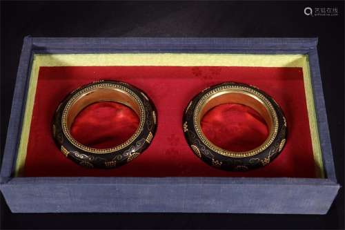 A Pair of Chinese Carved Agar-Wood Bracelets with Gilt Silver Inlaid