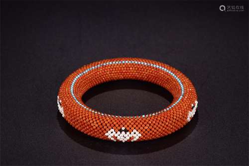 A Chinese Carved Coral Bracelet