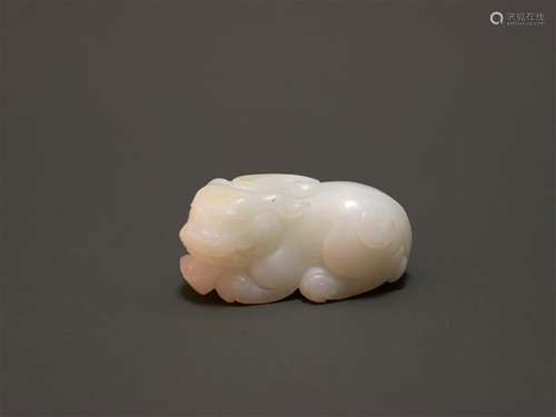 A Chinese Carved Jade Foo-Dog