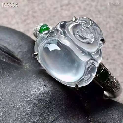A Chinese Carved Jadeite Buddha Ring