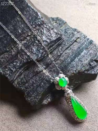 A Chinese Carved Jadeite Pendant and Necklace