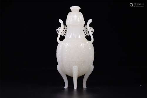 A Chinese Carved Jade Vase with Cover