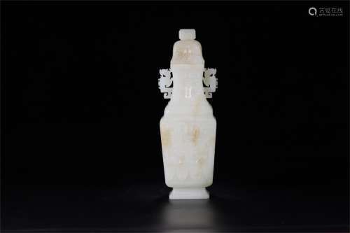 A Chinese Carved Jade Vase with Cover