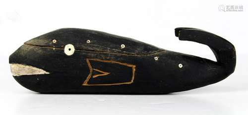 Eskimo or Yupik carved wood whale form rattle