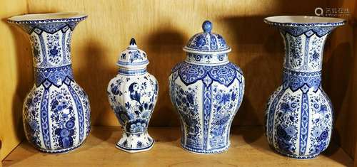 One shelf of Delft blue and white vases