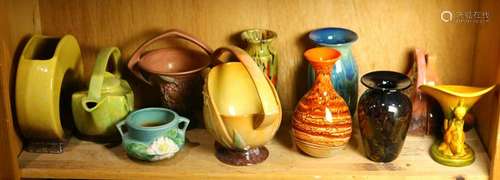 One shelf of mostly Roseville pottery