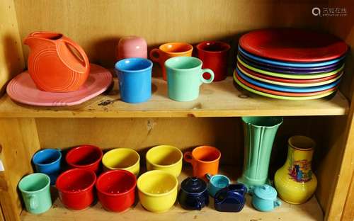 Four shelves of Fiestaware