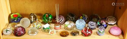 One shelf of mostly paperweights