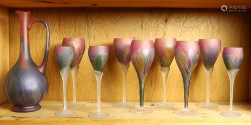 One shelf of art glass stemware, including wine glass