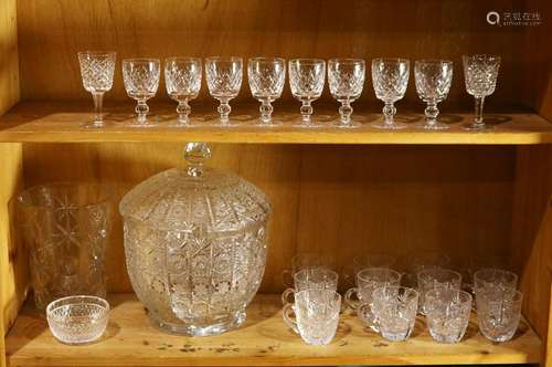 Two shelves of crystal and cut glass