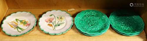 One shelf of majolica executed in green