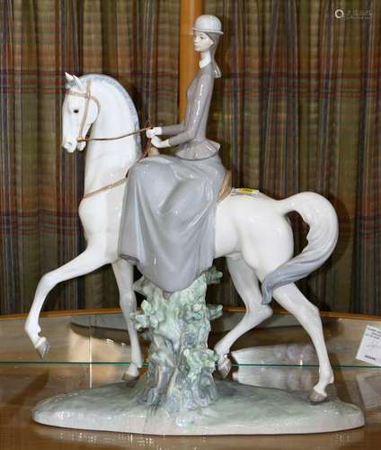 Lladro porcelain figural group depicting a horseback