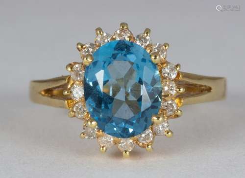 Blue topaz, diamond, 14k yellow gold ring