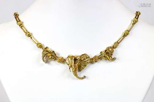 Diamond, 18k yellow gold elephant necklace