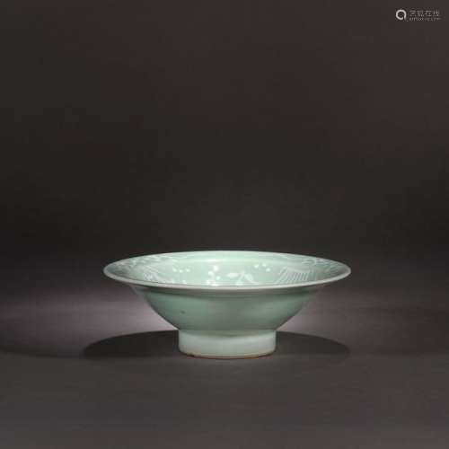 Celadon glaze ceramic bowl with floral vegetal mot…