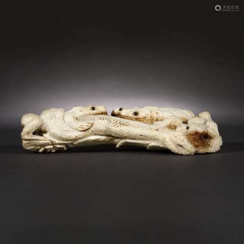 Bone okimono of three coiled reptiles and a serpen…
