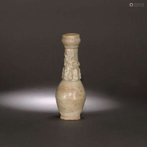 Qingbai glaze ceramic vessel with relief vegetal m…
