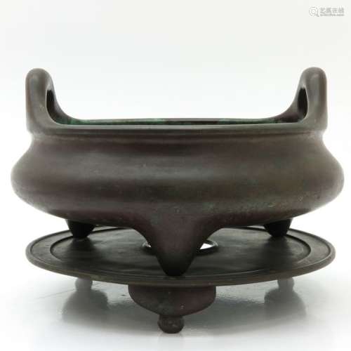 A Rare Chinese Imperial Bronze Tripod Censer