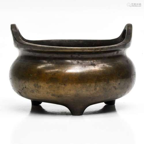 A Chinese Bronze Tripod Censer