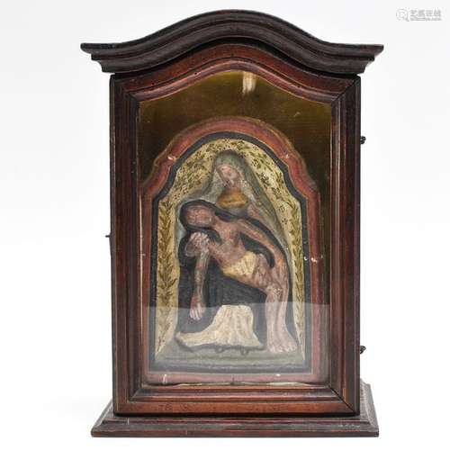 A 19th Century Vitrine with Paper Mache Pieta