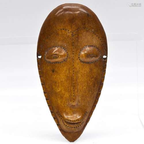 A West African Carved Wood Mask