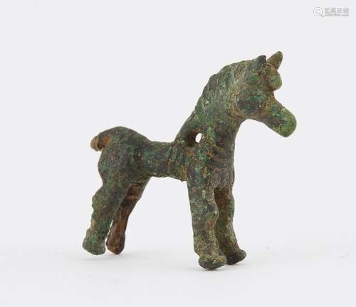Cheval en bronze. Long. : 4 cm. Age du bronze, déb…