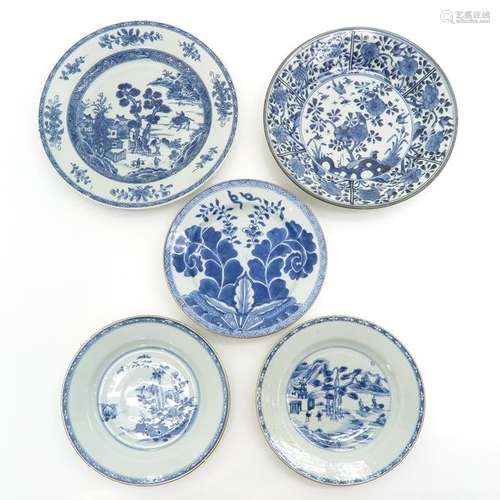 A Collection of Five Blue and White Plates