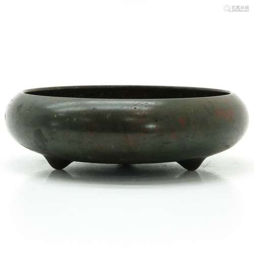 A Chinese Bronze Tripod Censer