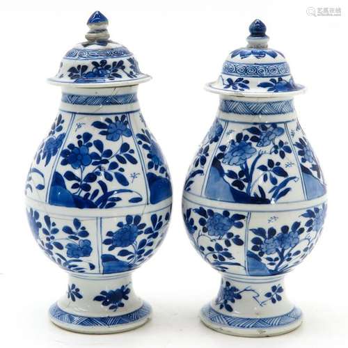 Two Blue and White Vases with Covers