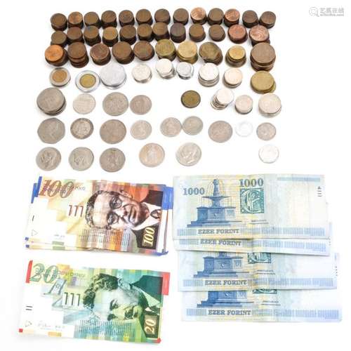 A Diverse Collection of Coins and Paper Money