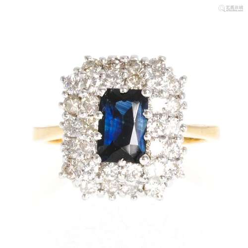 A Ladies Diamond and Sapphire Ring