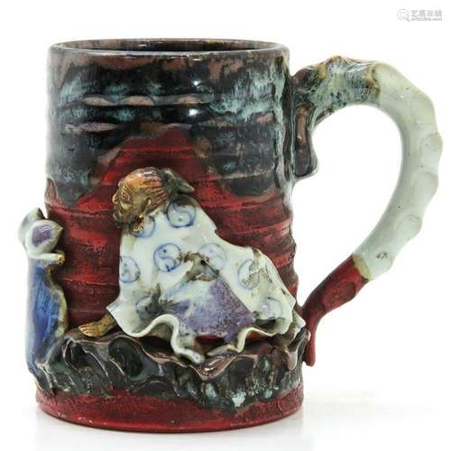 An Asian Pottery Mug