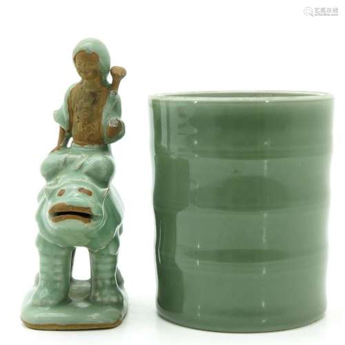 A Celadon Brush Pot and Sculpture