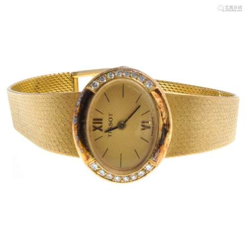 A Ladies 18KG Tissot Watch