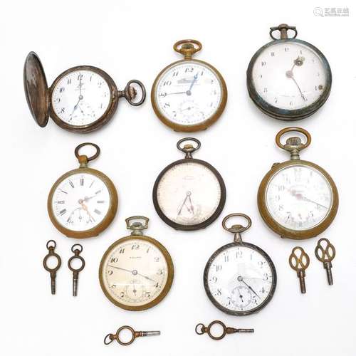 A Diverse Collection of Pocket Watches and Keys