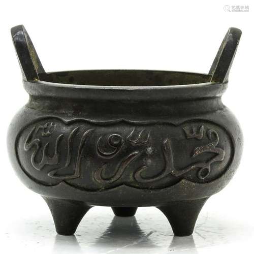 A Chinese Bronze Tripod Censer