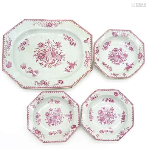 A Set of Four Pink and White Dishes