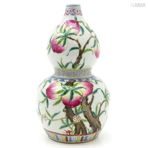 A Chinese Famille Rose Gourd Vase