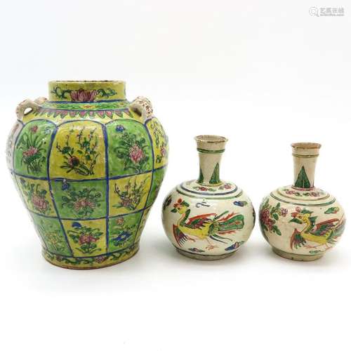 A Polychrome Earthenware Martaban Jar and Two Vase…