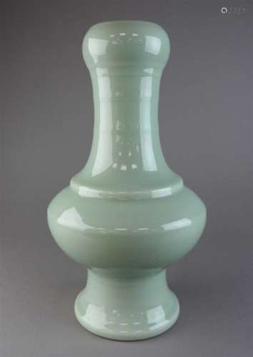 A Chinese celadon porcelain garlic mouth vase, bearing Yongzheng mark, the ribbed cylindrical