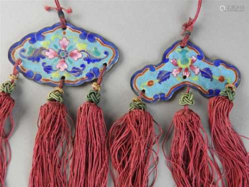 Two Chinese Canton famille rose enamel tasselled pendants, Qing dynasty 19th century, of wind