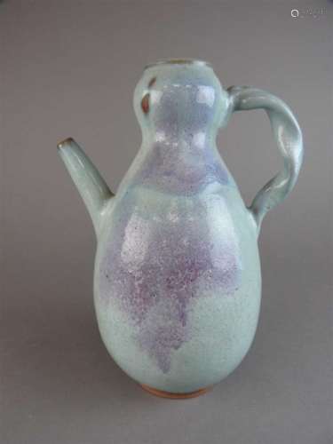 A Chinese Junyao style ewer of pear shape with bulbous neck and rope twist handle and short spout in