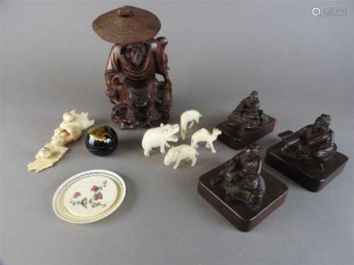 A mixed lot to include three Japanese figural scroll seals, carved as a man on a minogame turtle,