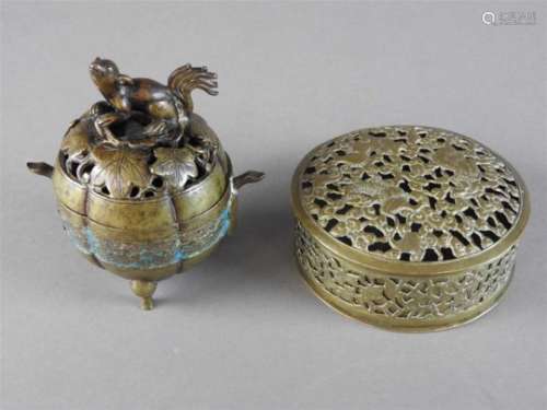 A Chinese bronze squirrel censer, Ming dynasty, of lobed form with pierced leaf cast cover