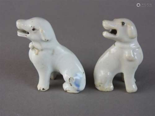 Two Chinese export porcelain blanc de chine hounds, Qing dynasty, 18th century, brown glazed eyes,
