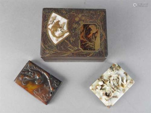 A Small Japanese lidded lacquered box and two Chinese carved hardstone tablets