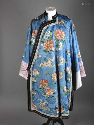 A Japanese girl's silk stage costume kimono, Meiji period, (1868-1912), worked in coloured silk