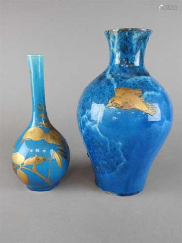 A Japanese Kyoto-Awaji bottle vase, early 20 th century, gilded in relief with a bird and insect