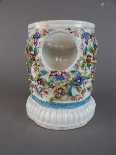A rare Chinese famille rose pocket watch holder, Qianlong (1736-95), the florally encrusted vessel