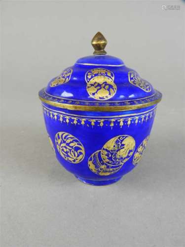 A Canton enamel cup and cover, Qing Dynasty, 19 th century, the body and stepped cover gilded with